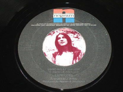 Capricorn (21) : Baby Likes To Do The Rock And Roll (7", Single)
