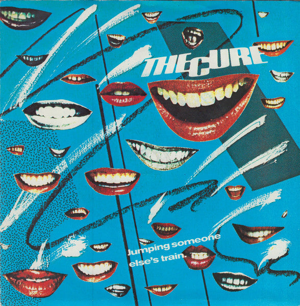 The Cure : Jumping Someone Else's Train (7", Single, Blu)