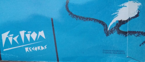 The Cure : Jumping Someone Else's Train (7", Single, Blu)