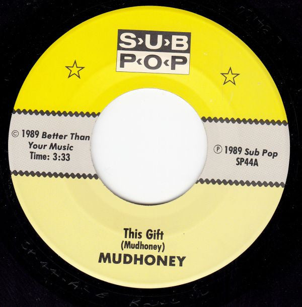 Mudhoney : This Gift b/w Baby Help Me Forget (7", Single)