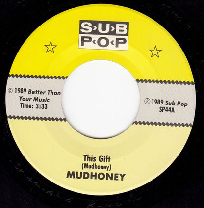 Mudhoney : This Gift b/w Baby Help Me Forget (7", Single)